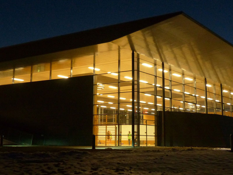 sports facility lit up to illustrate how an energy consultant can help with energy management